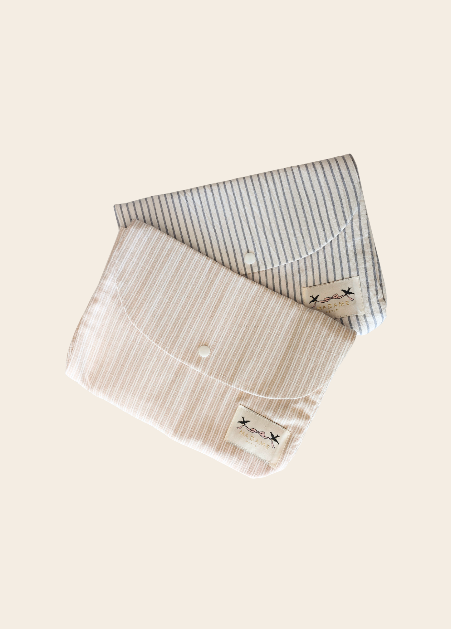 Bolsita Porta Muda Rayas Beige